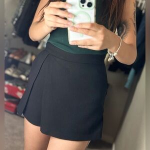 Colombian design, black mini skort, size 4